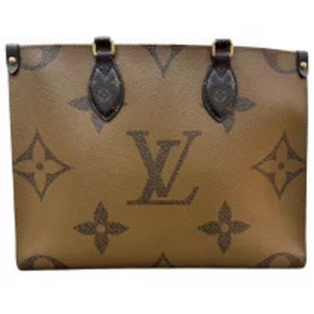 Louis Vuitton The Go Monogram On Handbag Brown